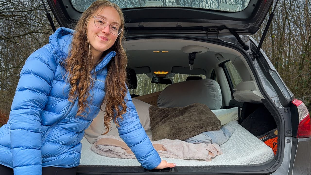 YouTube post by @Katieroams for WOLFBOX. Caption reads: Full-Time Car Camping | One Last Night in My Car....