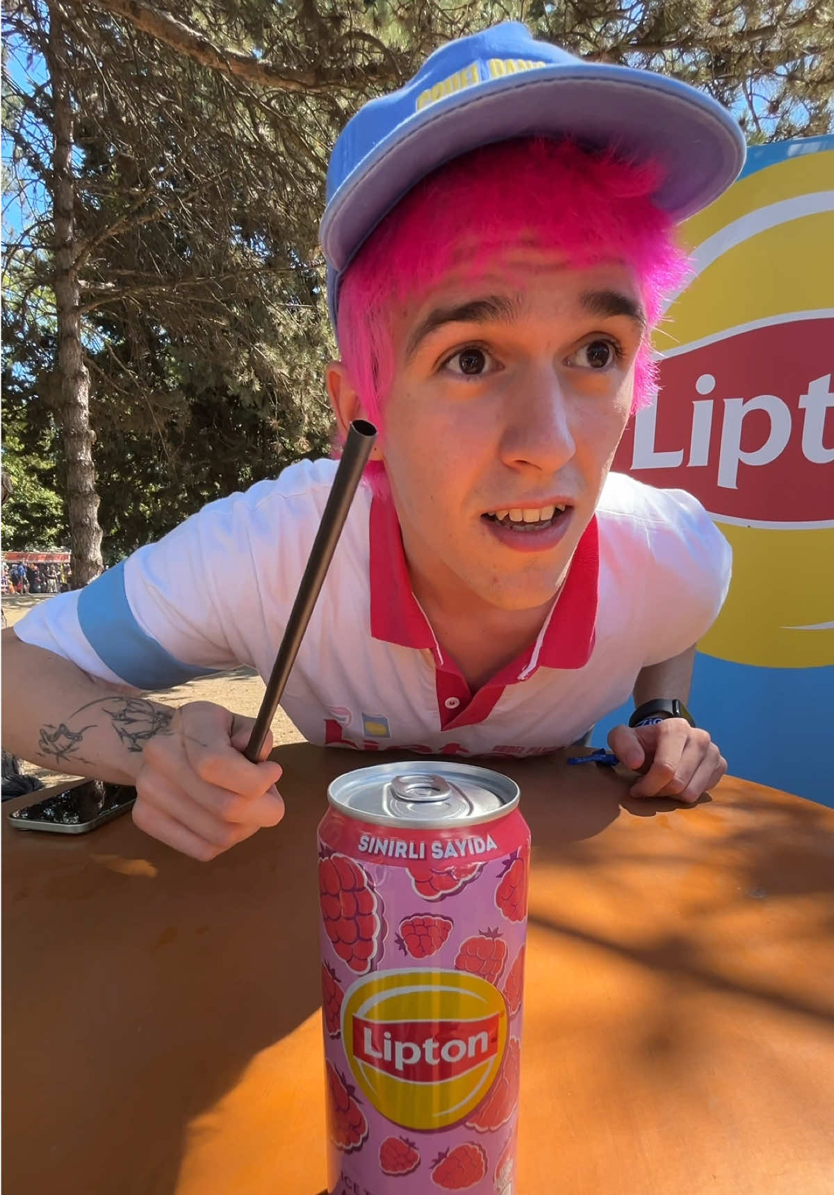 TikTok post by @valentino.x1 for Lipton Ice Tea Switzerland. Caption reads: AD. This is what Sziget sounds like and this is....