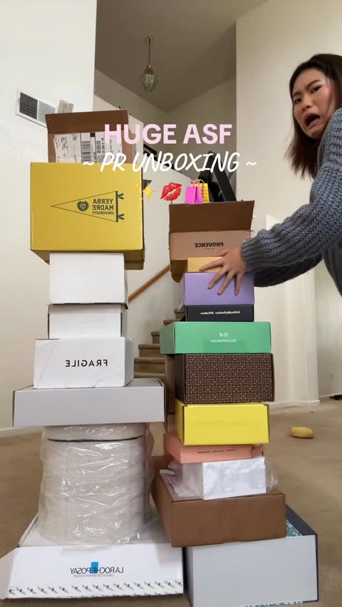 Instagram post by @jenyyng for Naturium. Caption reads: HUGE pr unboxing! 💋🌟🛍️ this is your sign to....