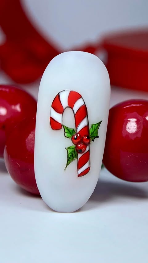 Instagram post by @catherina_kety for Madam Glam. Caption reads: Christmas Candy Cane ❤️ @madam_glam Color ✨True....