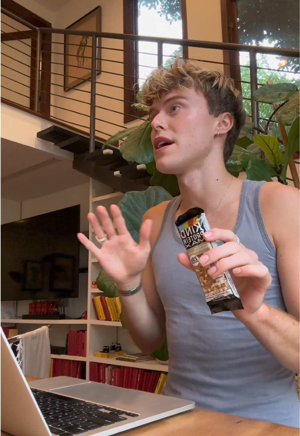 TikTok post by @nmillz1 for KIND Snacks. Caption reads: A ‘get all the protein you can’ kind of day is a....