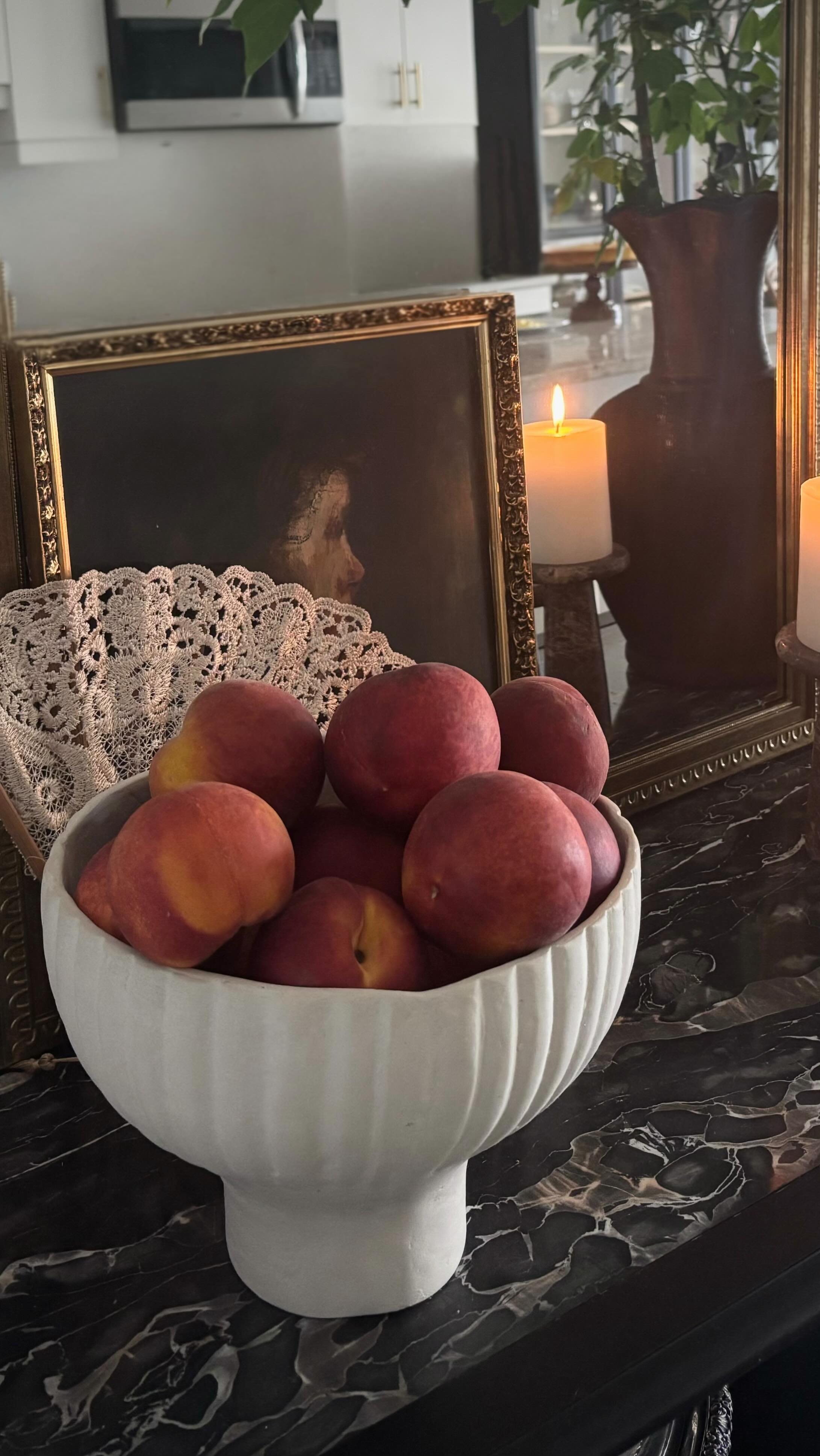 Instagram post by @natashalao for Elle Decor. Caption reads: Styling my sideboard with these beautiful pieces....