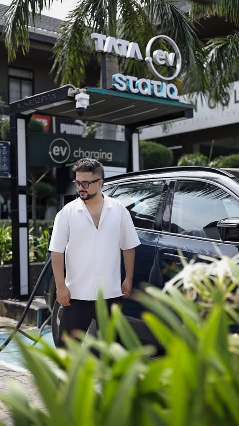 Instagram post by @theakshaypathak for TATA.ev. Caption reads: [...] where our car got charged with the....