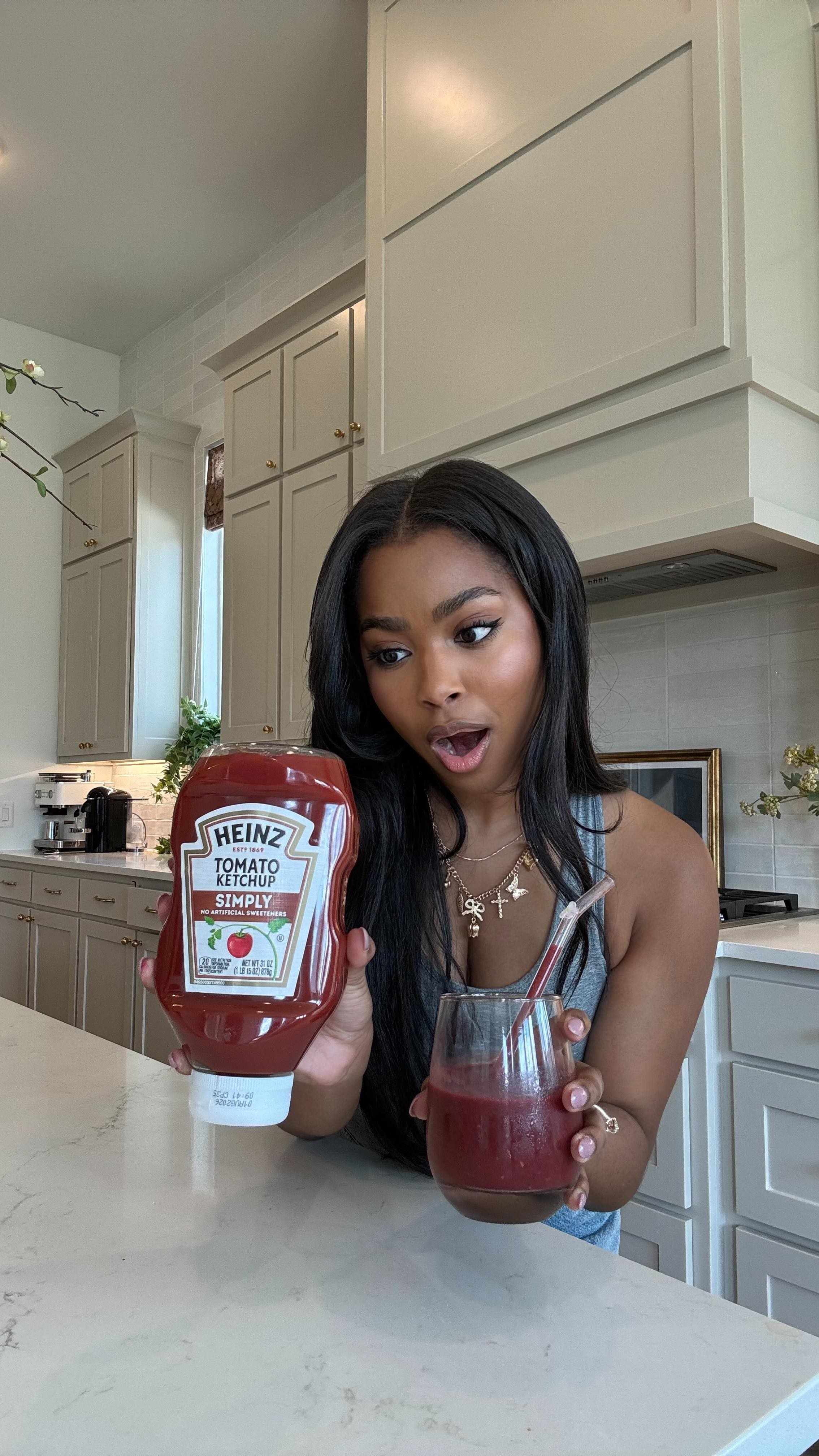 Instagram post by @malloryhudsonxo for Heinz. Caption reads: #HeinzPartner If tomatoes are a fruit, is ketchup....