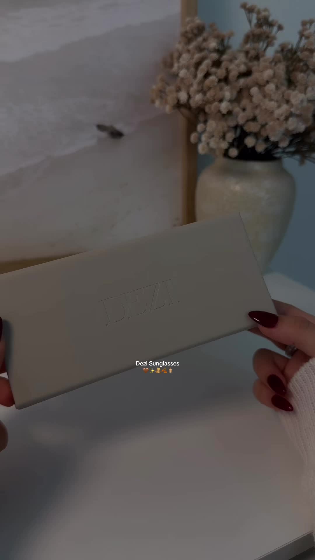 TikTok post by @maarlaav for DEZI. Caption reads: @DEZI EYEWEAR 🤎✨ #dezi #dezieyewear [...].