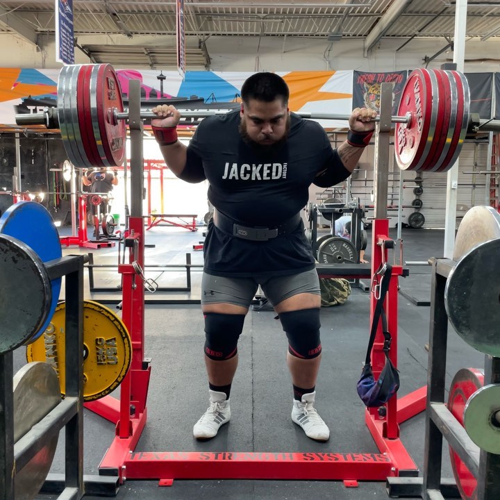 Instagram post by @mega.gojira for Jacked Factory. Caption reads: •865LBS/392.5KG x 1 •705LBS/320KG x 8 There are....