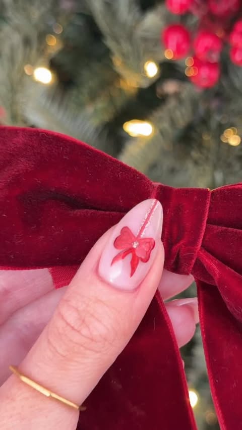 Instagram post by @nailsbycaroline_ for Balsam Hill. Caption reads: burgundy red christmas ❤️✨

AD @balsamhilluk noble....