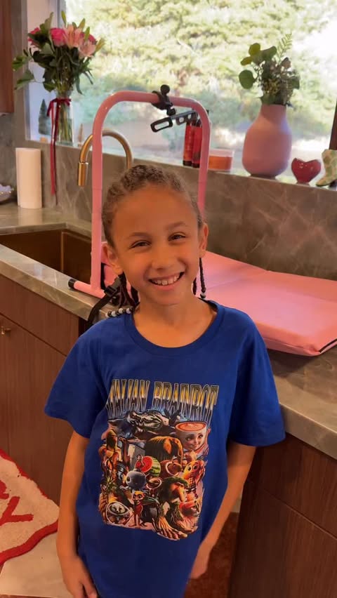 Instagram post by @myleyj for Tangle Teezer. Caption reads: bringing his curls back to life after braids....