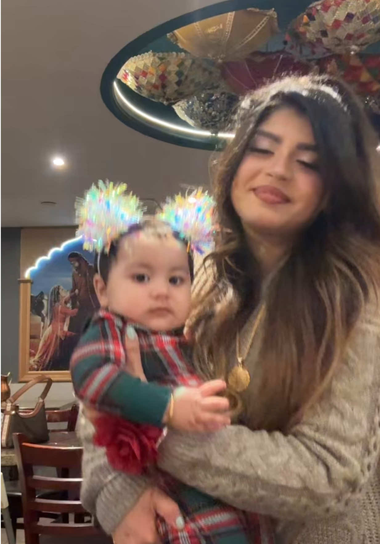 TikTok post by @alishbaqanoot for Old Navy. Caption reads: Wrapped in love, dressed in comfort 💕 .#babylove....