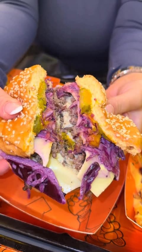 Instagram post by @phatbuns.uk for Get Reviewed Liverpool. Caption reads: Took a trip to PHAT Buns to try their new NYC menu....