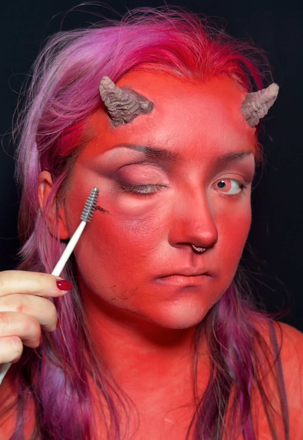 TikTok post by @saph.art for UNIQSO. Caption reads: Devil makeup❤️ Let’s hope I can get a few....