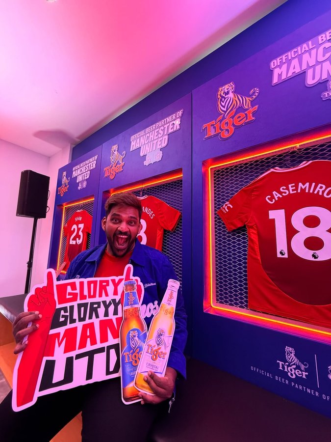 Instagram post by @joshmadj for Tiger Beer Malaysia. Caption reads: The Trafford Den 🔥 Thank you @tigerbeermy for....