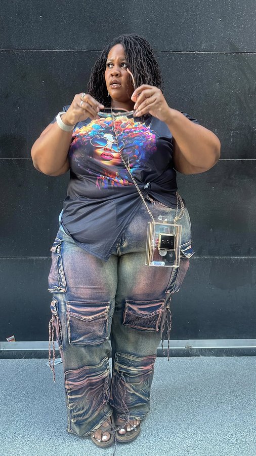 Instagram post by @elliemariyo for Ashley Stewart. Caption reads: [...] snacks AND my confidence 🤣🥳😛....