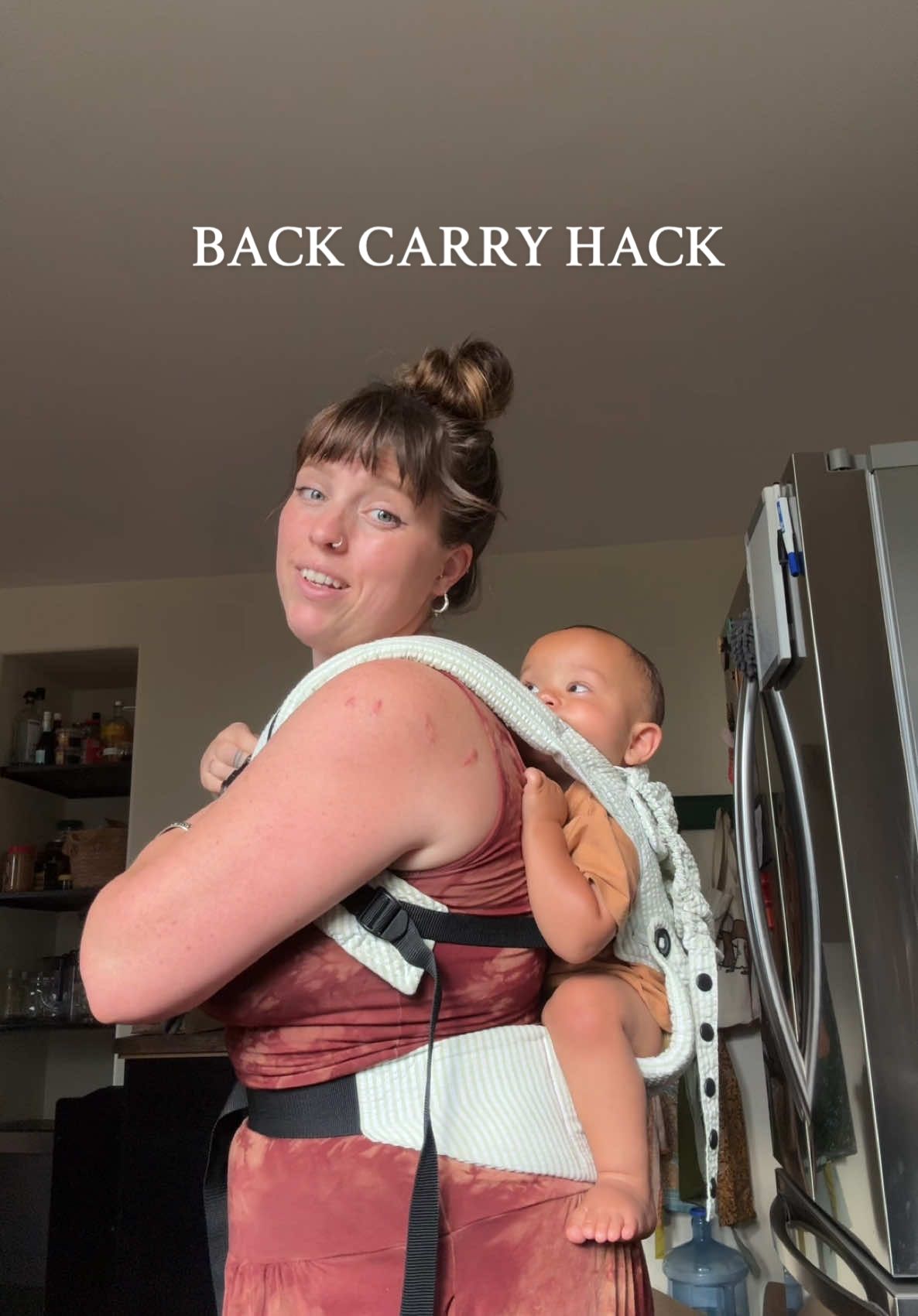 TikTok post by @ebbymoyer for Baby Tula. Caption reads: This baby carrier is from @Baby Tula but I think....