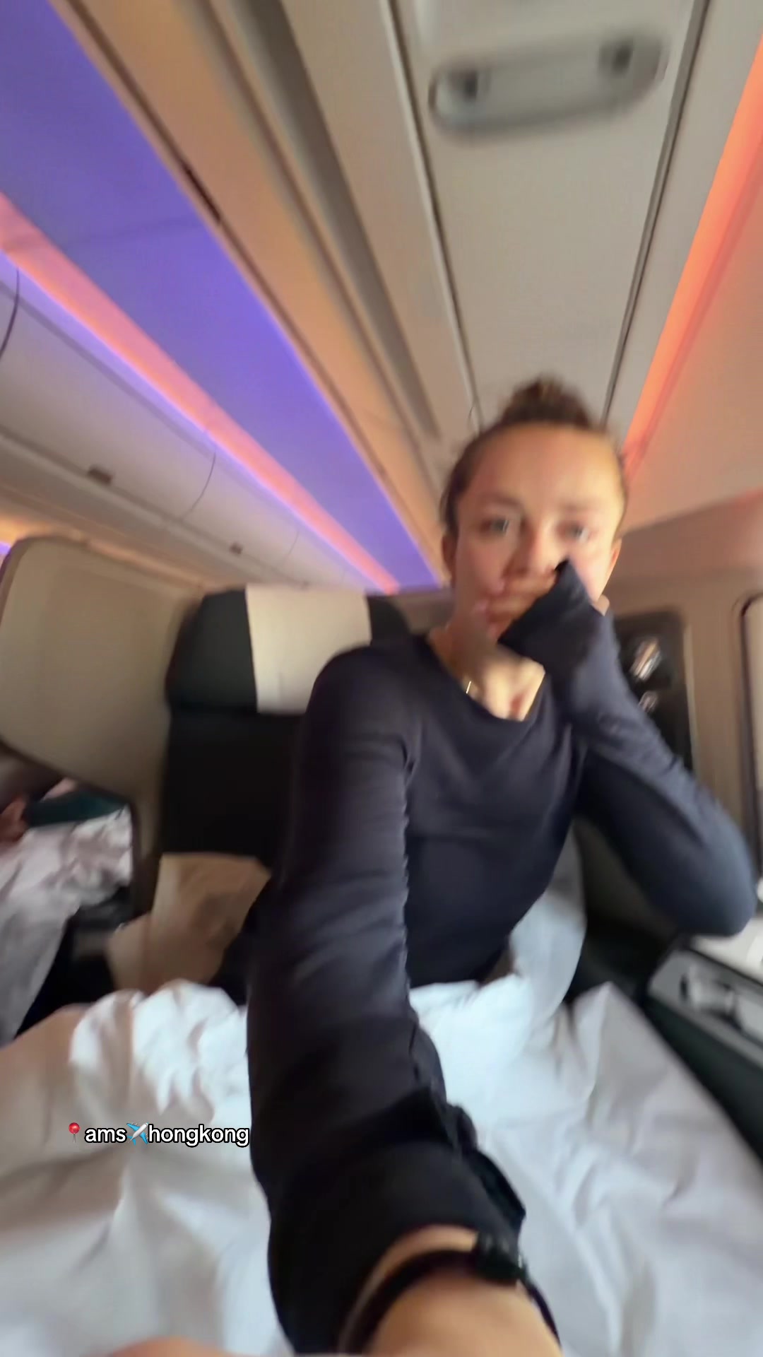 TikTok post by @tessscholten for Cathay Pacific. Caption reads: [...] for HEEL VEEL aussie yapvlogs!!! @Cathay....