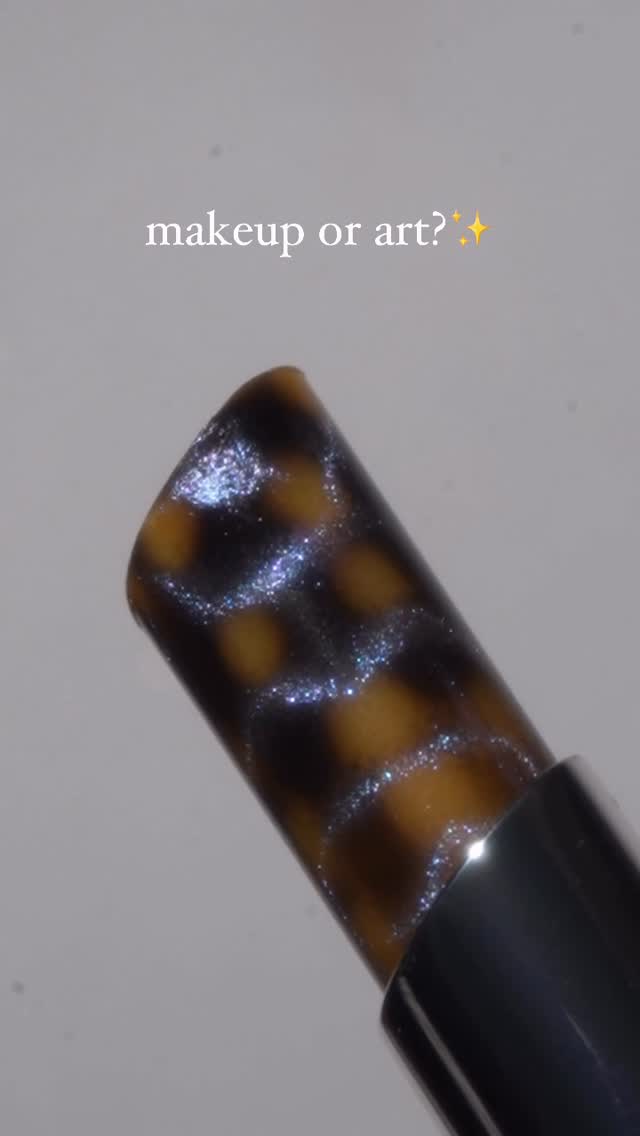 Instagram post by @glamsmitty for CBeautyMall. Caption reads: makeup or art?✨ My first time trying Little Odine,....