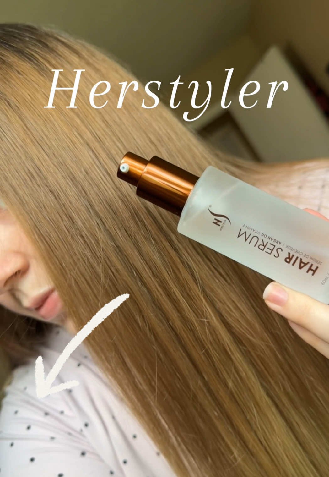 TikTok post by @kaeleighelizabeth for HerStyler Haircare. Caption reads: Wait… did you see that shine?! This was my first....