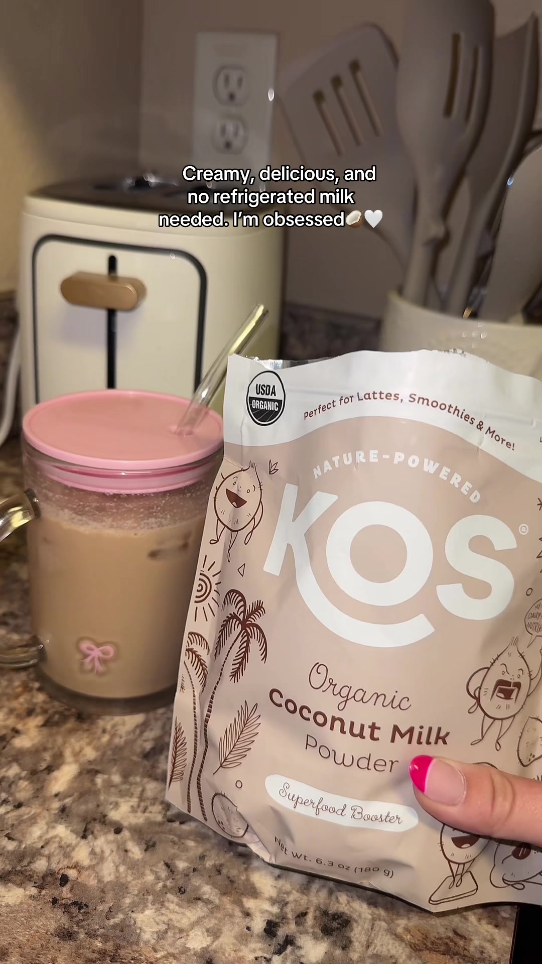 TikTok post by @em_ilyyyy for KOS. Caption reads: [...] coffee lovers, this one’s for you 🥥 @KOS....