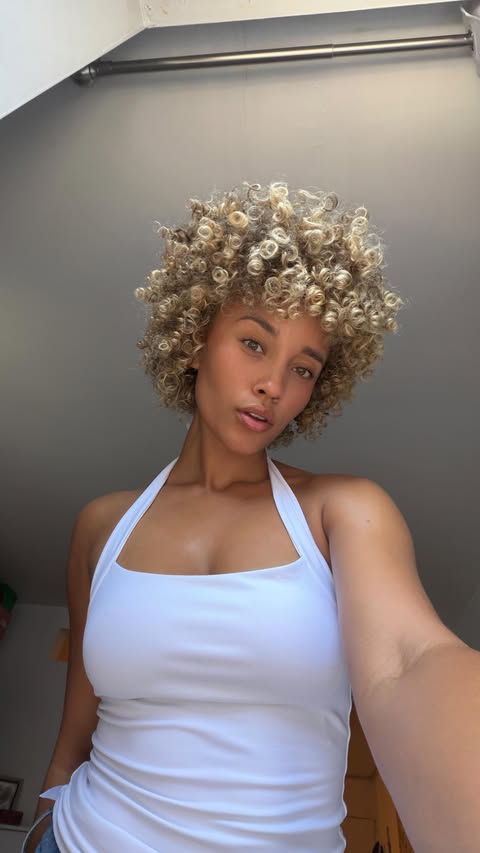 Instagram post by @officialellesmith for OLAPLEX. Caption reads: @olaplex changing the game for us in the best way....