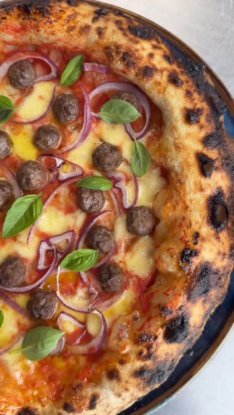 Instagram post by @7thfloorpizza for Ooni. Caption reads: What do you think about meatballs on pizza? Loved....