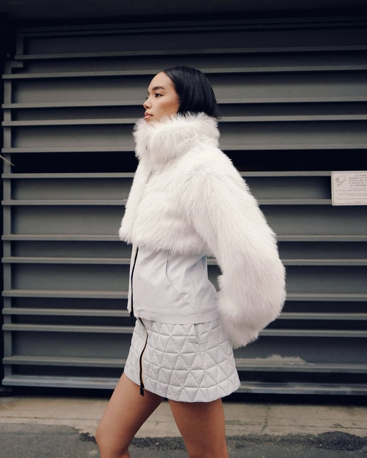 Instagram post by @dolmalisa for K-way. Caption reads: Contemporary urban feelings in @kway_official....