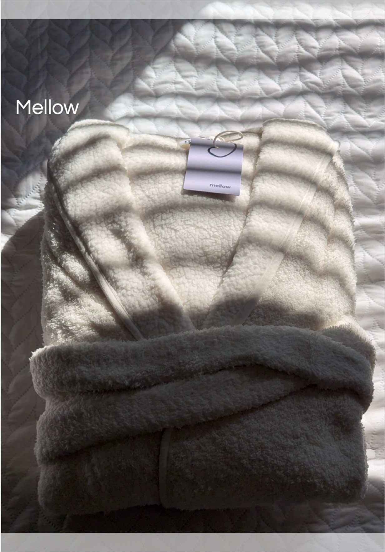 TikTok post by an influencer for Mellow Sleep. Caption reads: THE softest robe EVER ☁️ @Mellow Sleep #plush....