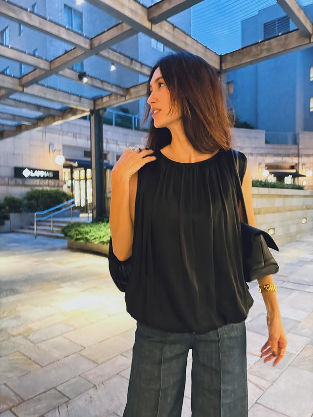 Instagram post by @bk_olive for Theory. Caption reads: [...] on the town 👯 in my new blouse from....