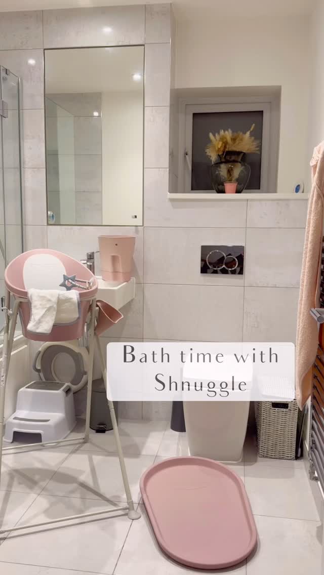 Instagram post by @create_make_and_play for Shnuggle. Caption reads: #AD Mila’s first bath with @Shnuggle in their....