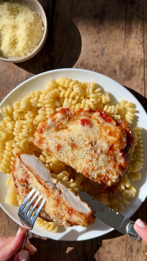 Instagram post by @justataste for Made In Cookware. Caption reads: CHICKEN PARM 2.0! 🍝

Noni’s iconic chicken....