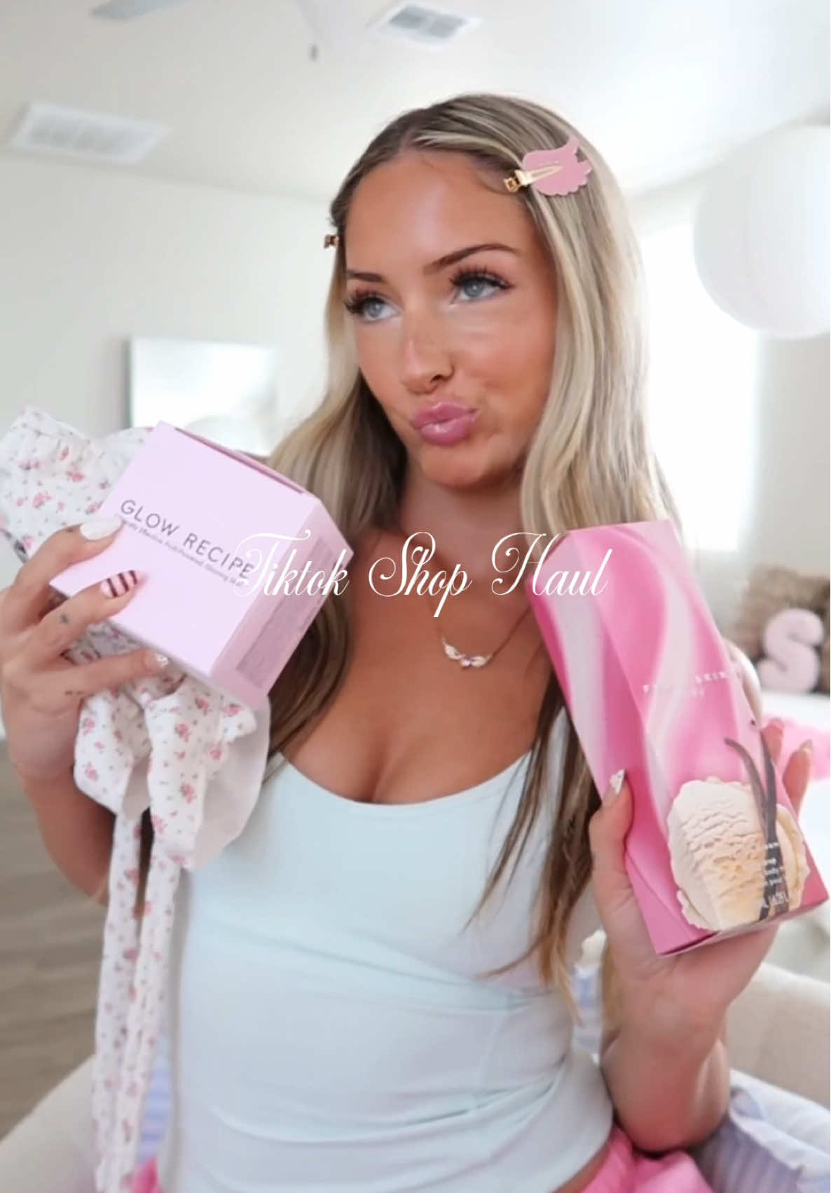 TikTok post by @sadiebaby08 for Emi Jay. Caption reads: recent tiktok shop haul 💘 @Emi Jay @Glow Recipe....