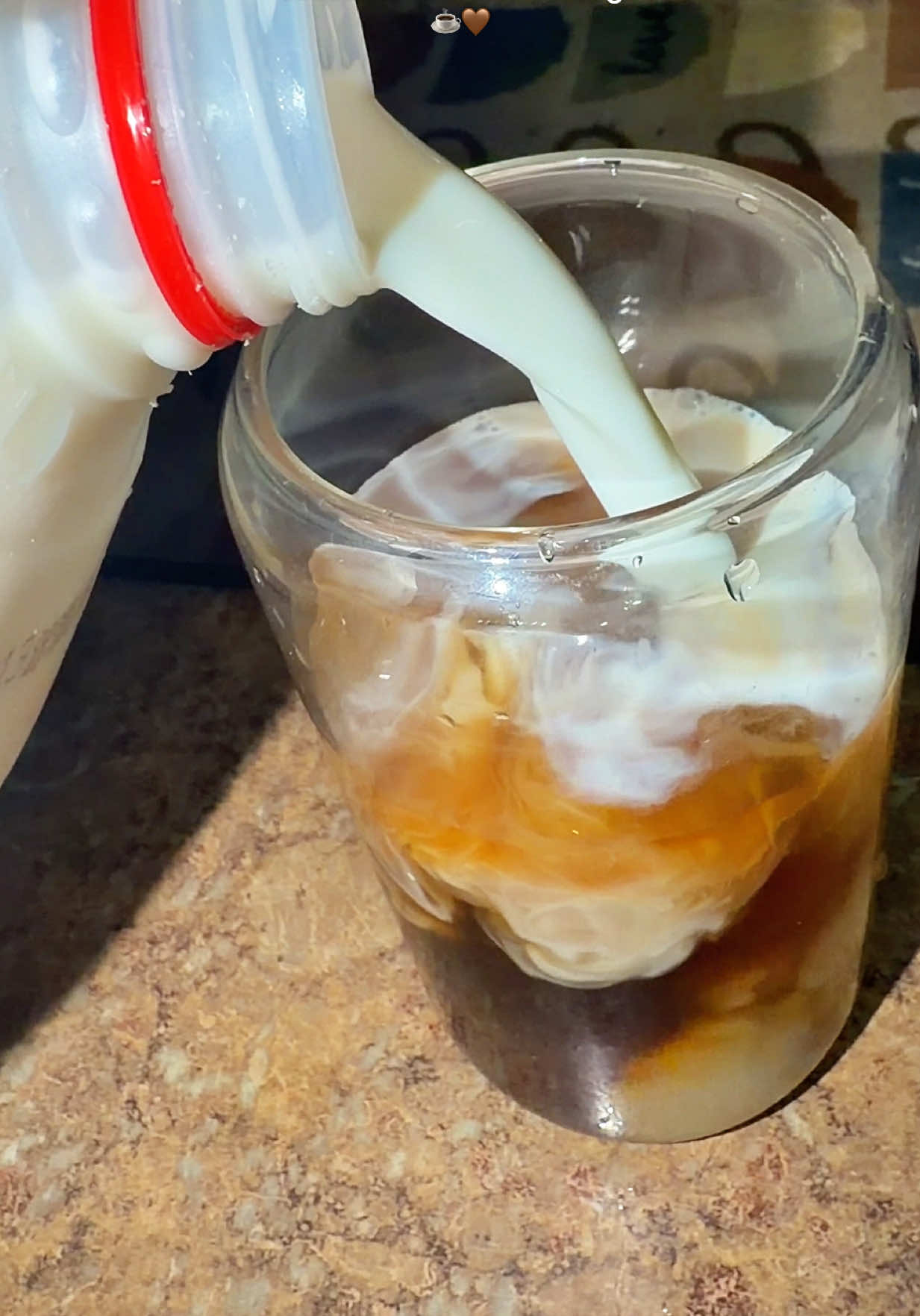 TikTok post by @kittycatx33 for Javy Coffee. Caption reads: Café vibes at home ☕️🤍 Smooth coffee concentrate....