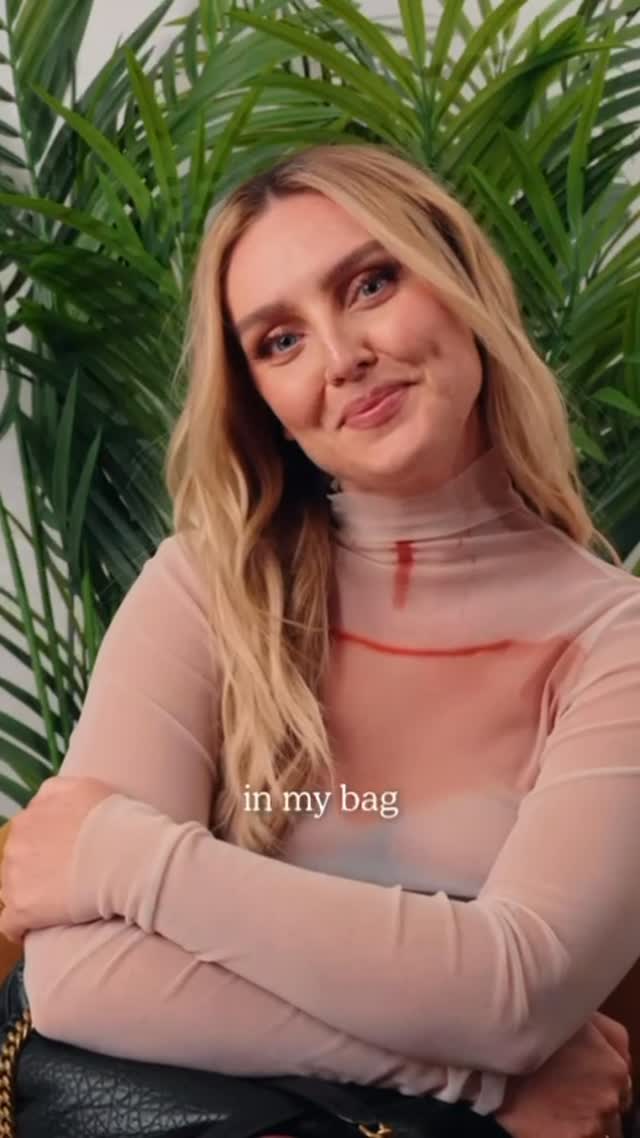 Instagram post by @perrieedwards for Hawaiian Tropic. Caption reads: AD You know I never leave the house without my....