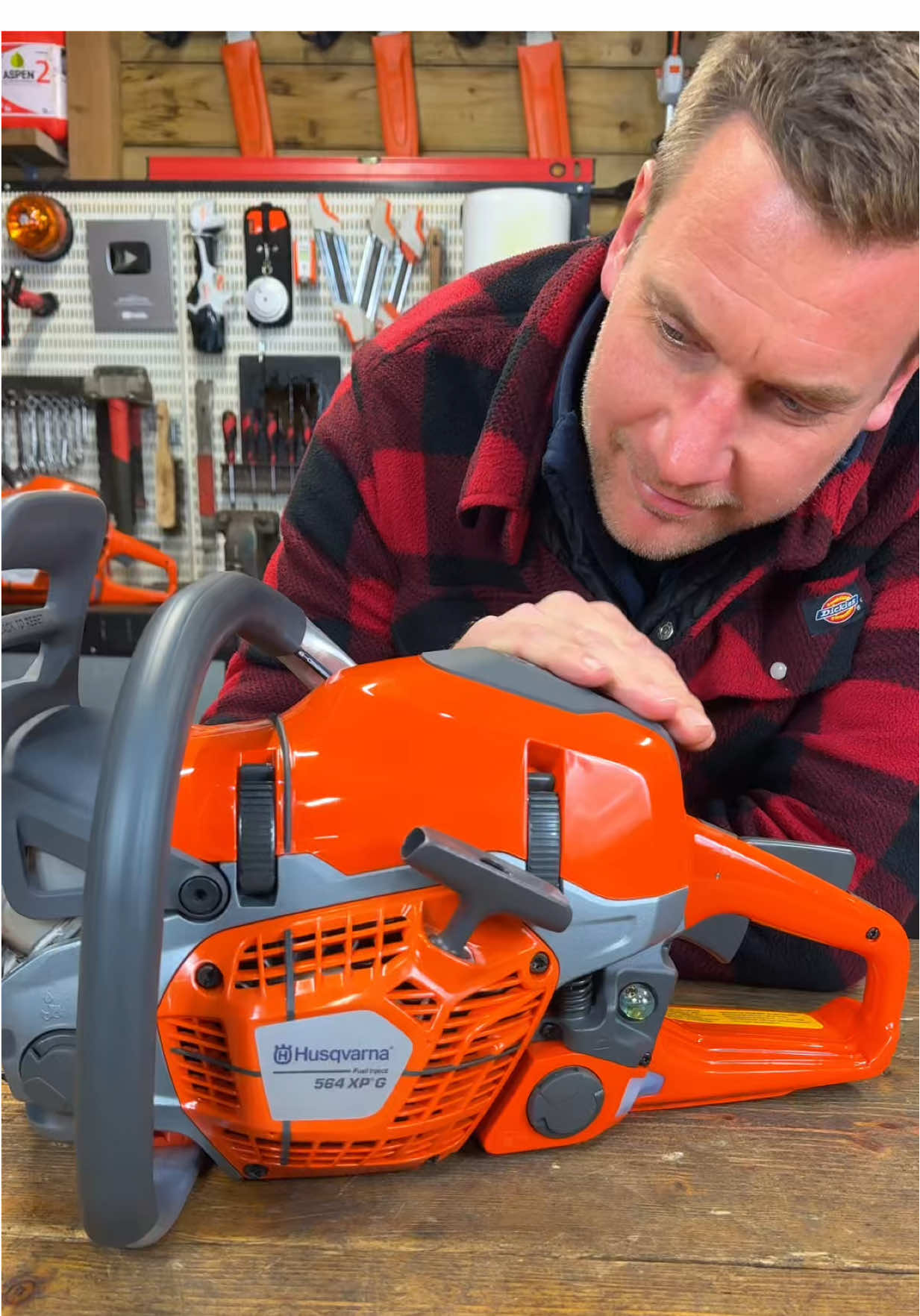 TikTok post by @machinerynation for Husqvarna. Caption reads: Unboxing the brand NEW Husqvarna 564XP Fuel....