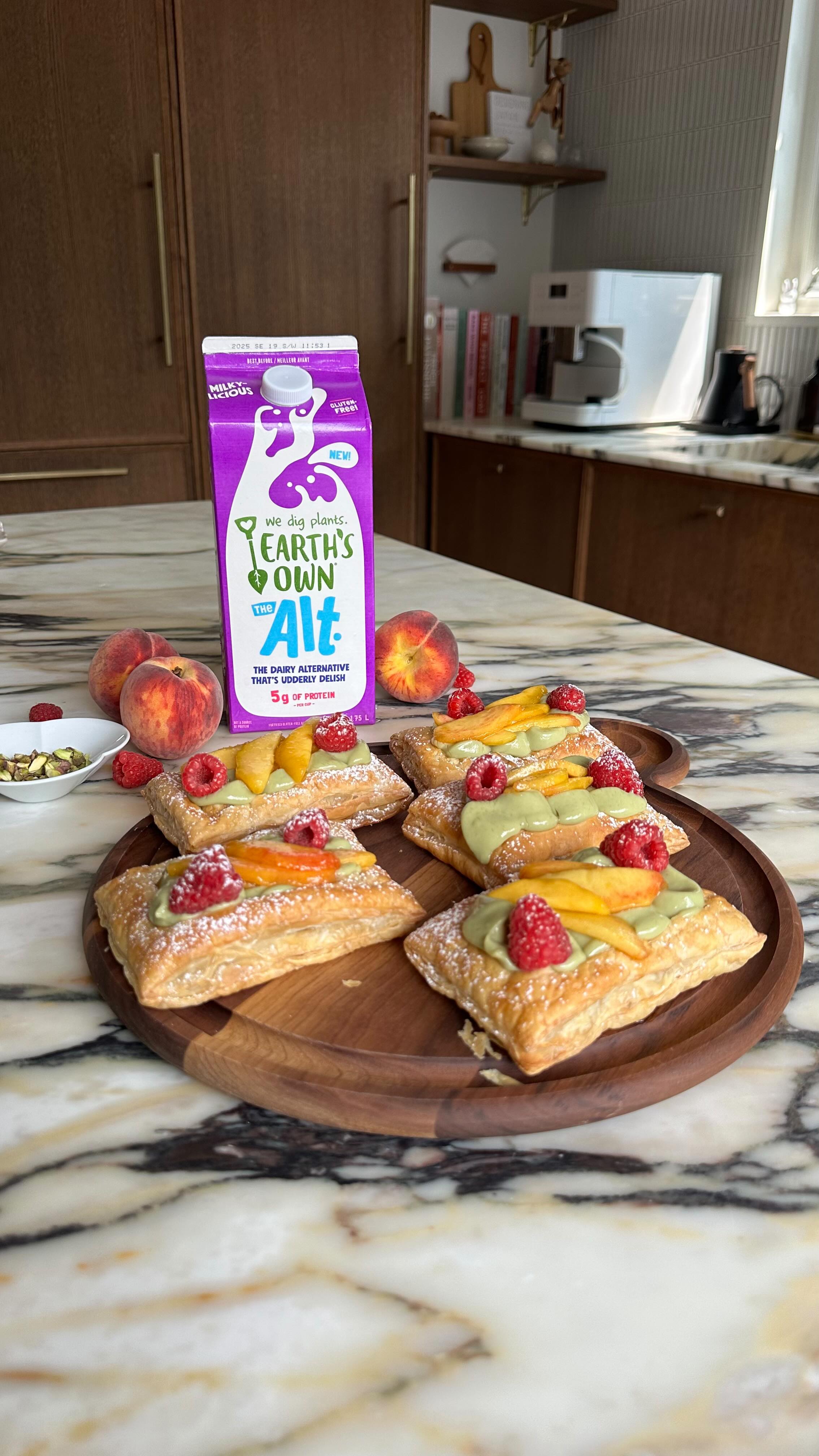 Instagram post by @sabrinastavenjord for Earth’s Own. Caption reads: Pistachio peach puff pastry using Earth’s Own The....