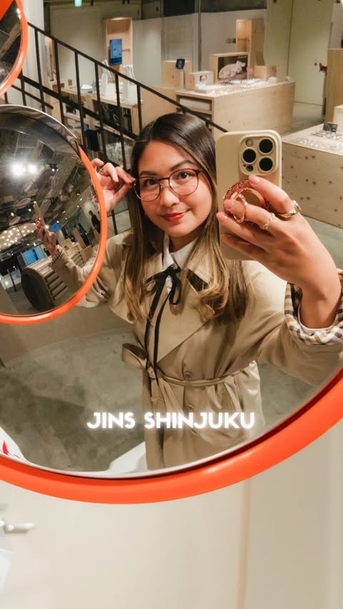 Instagram post by @thelarachannel for Jins. Caption reads: [...] souvenirs you can buy, especially at JINS....