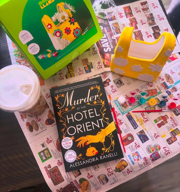 Instagram post by @ambersmagicallibrary for Simon & Schuster. Caption reads: Bookmail: Murder at the Hotel Orient by Alessandra....