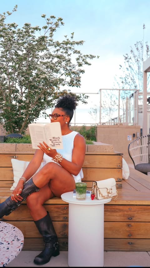 Instagram post by @amanirakeia for Coach. Caption reads: It’s me, my @coach Tabby 26 & a solo book date....