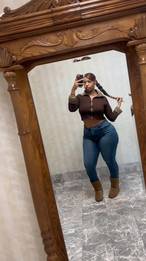 Instagram post by @prettyfacejazz for Universal Standard. Caption reads: Imagine how I feel 🤧🤧 its 30 degrees in Dallas....