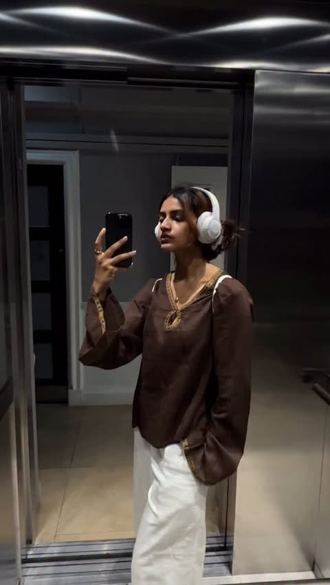 Instagram post by @riamehta__ for Reiss. Caption reads: [...] white blazer : gifted Blue coat : @reiss....