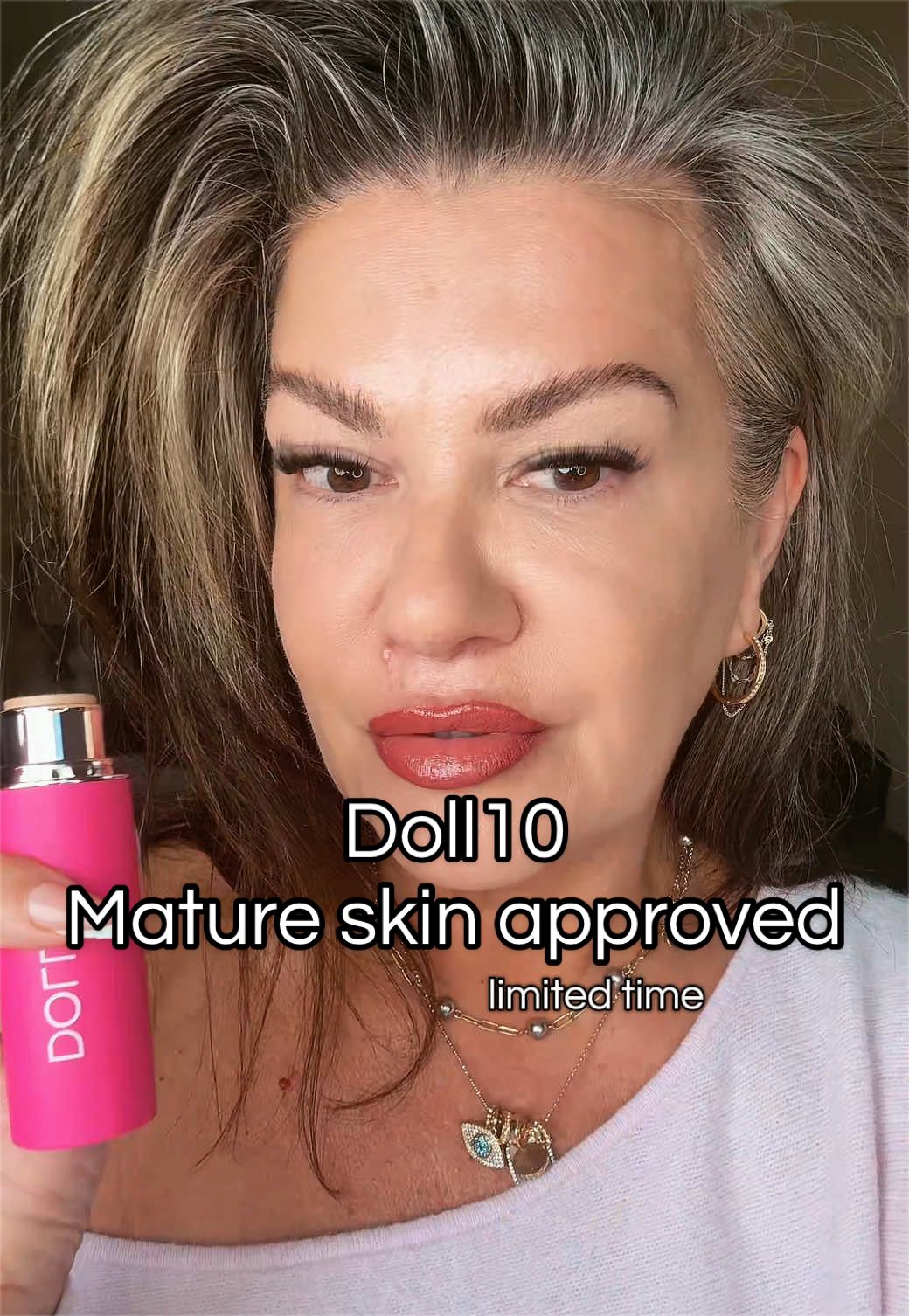 TikTok post by @therealrochellemarie for Doll 10 Beauty. Caption reads: [...] #over50makeup #doll10foundation @Doll 10....