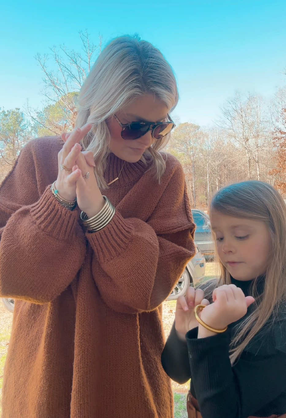 TikTok post by @lalajohnston for BuDhaGirl. Caption reads: [...] Eyewear @Dolce Vita Footwear @BuDhaGirl....