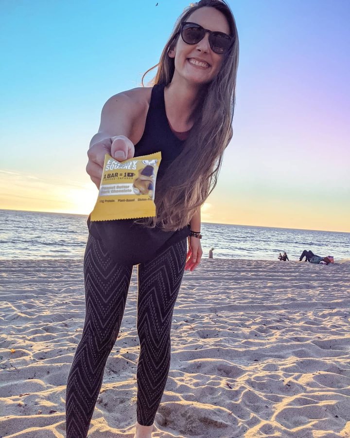 Instagram post by @outthere_travels for Quantum Squares. Caption reads: [...] TIME ✨✨ . We are partnering with....