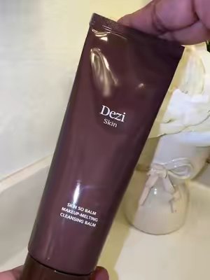TikTok post by @ezzieb214 for DEZI SKIN. Caption reads: The DEZI Skin, Skin so Balm melts through makeup,....