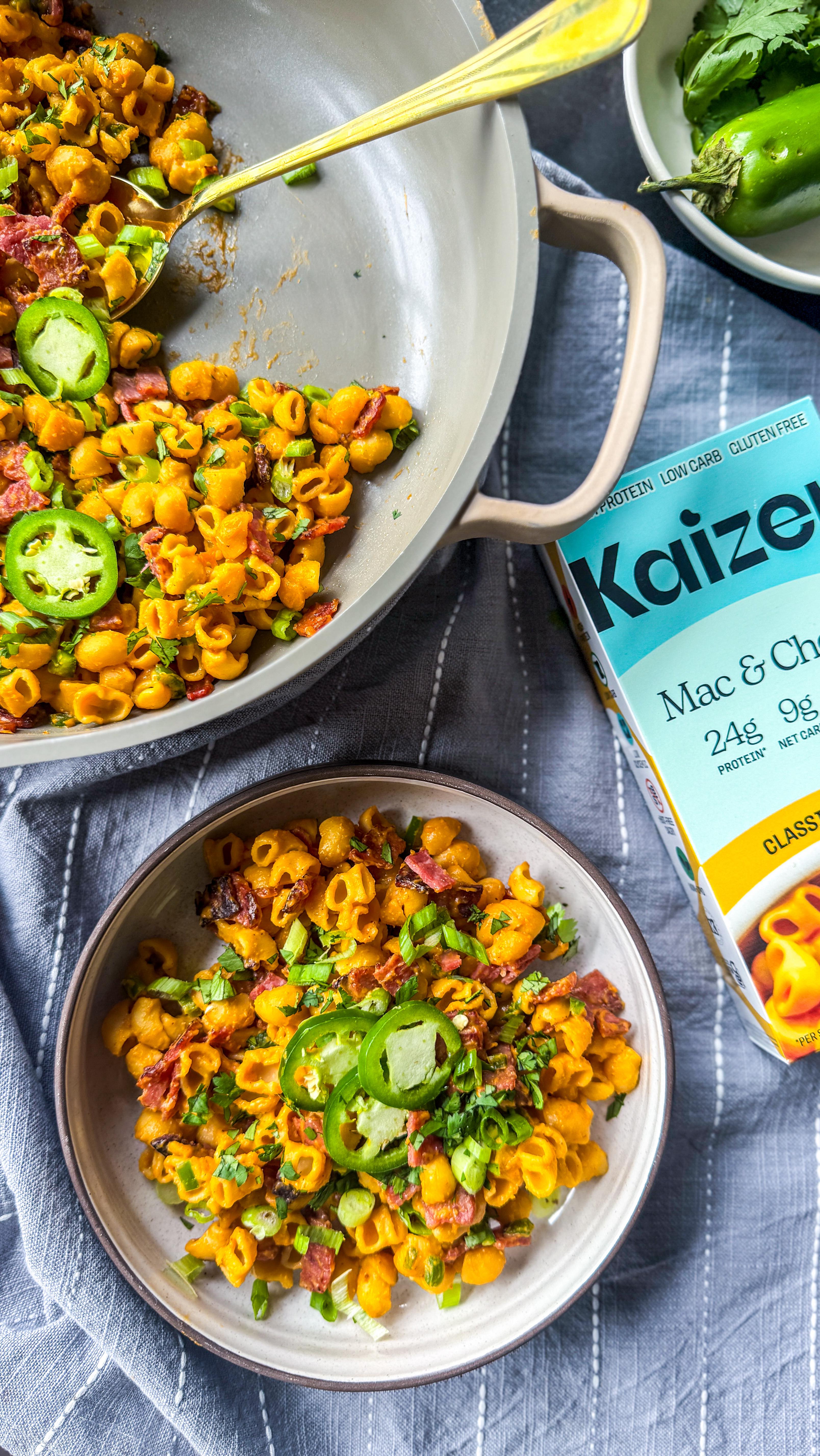 Instagram post by @theproteinsnackqueen for Kaizen Food Company. Caption reads: Contrary to popular belief, you can enjoy Mac &....