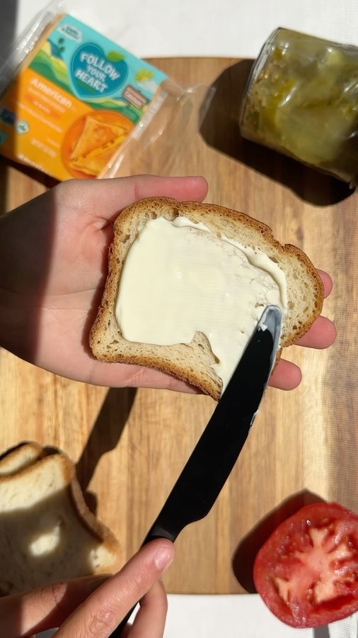 Instagram post by @jennaliveswell for Follow Your Heart. Caption reads: #ad my go-to lunch-break beach sandwich…

My....