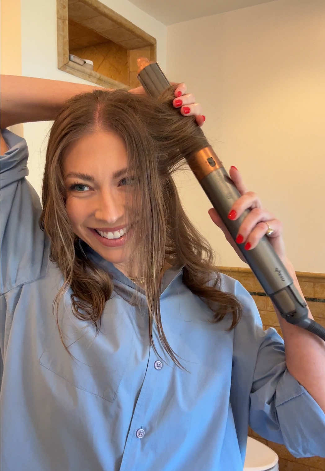 TikTok post by @stassischroeder for OLAPLEX. Caption reads: I’m not an authority on airwrap tutorials but this....