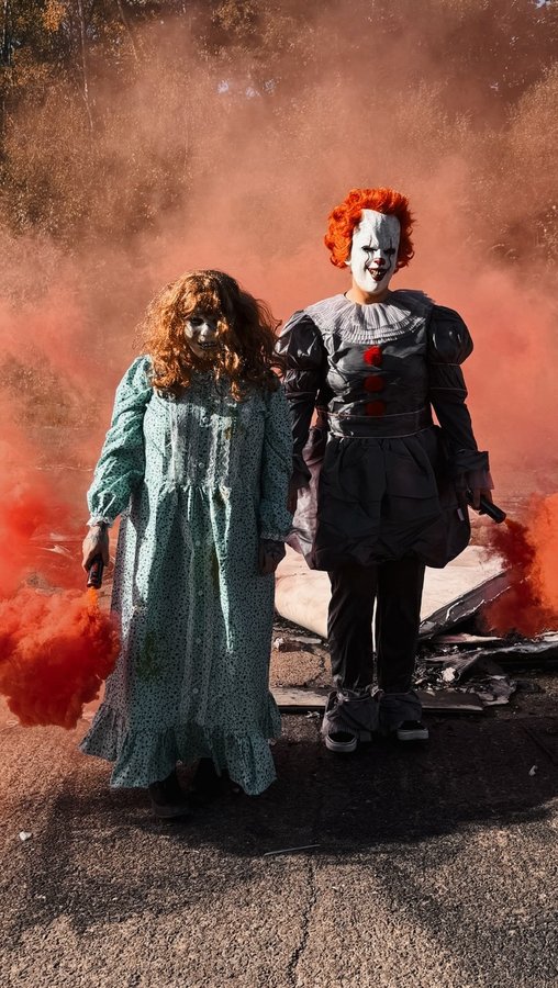 Instagram post by @msmancey_ for Smiffys. Caption reads: Just two normal girls… well, until the glitch 💀🎈....