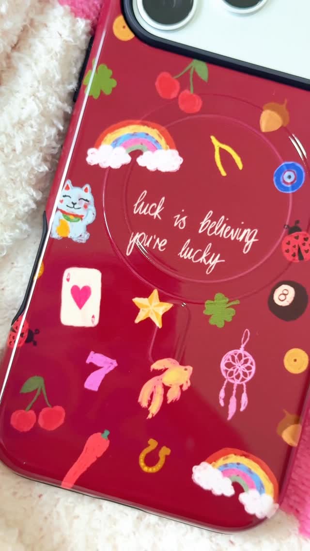 Instagram post by @seeingmoreofsarah for The Dairy. Caption reads: New phone, who dis? 🍀🍒⭐️🌈🐞 Case @thedairy....