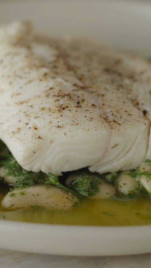 Instagram post by @lydialoo12 for Planet Oat. Caption reads: Flaky halibut, herby butter beans, salsa verde,....