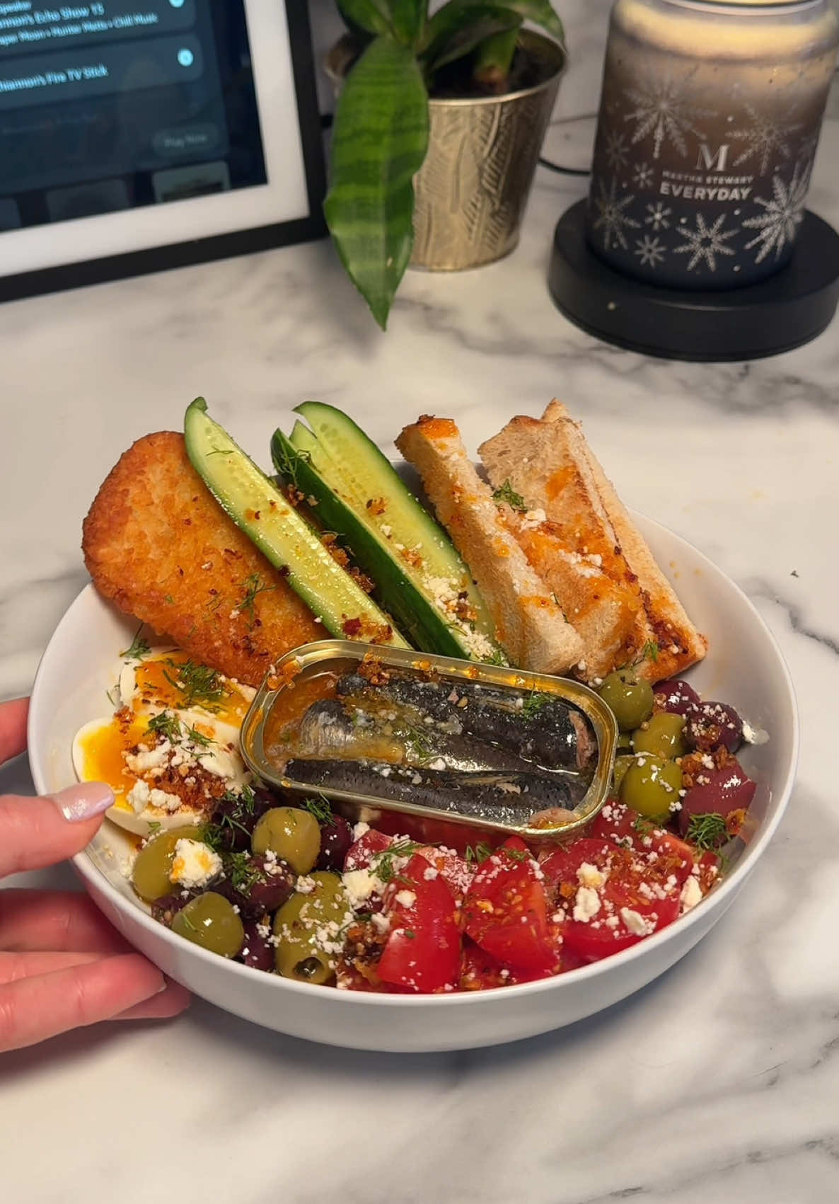 TikTok post by @reviskitchenn for Wild Planet Foods. Caption reads: [...] savory snack plate featuring @Wild Planet....